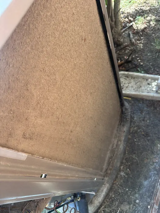 Outdoor condenser coil fully clogged with dirt