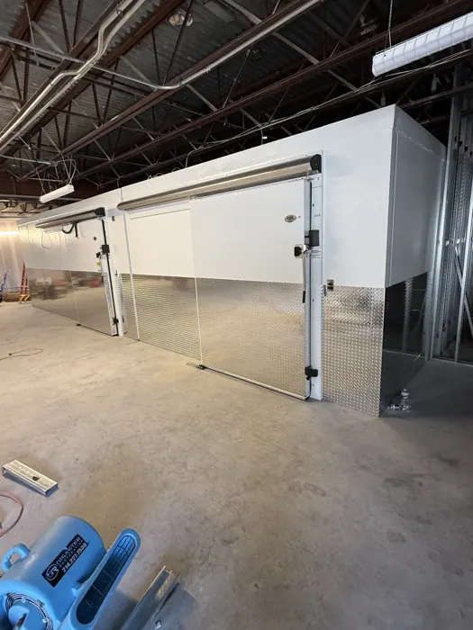 Commercial walk-in cooler build-out with sliding door