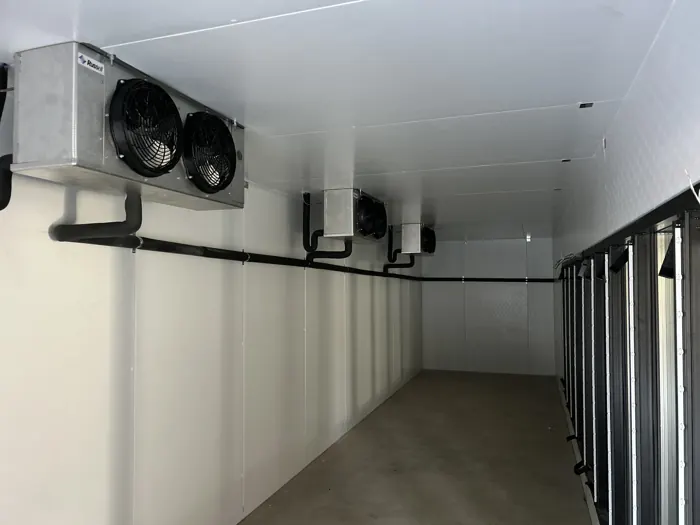 Walk-in cooler evaporators with insulated refrigeration piping