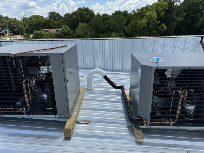 Pair of walk-in freezer condensing units on a rooftop