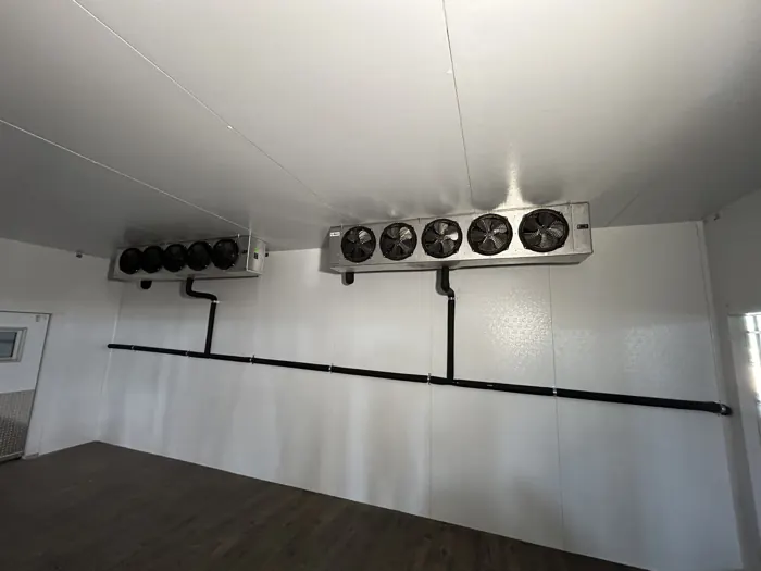 Walk-in freezer evaporator units and refrigeration lines